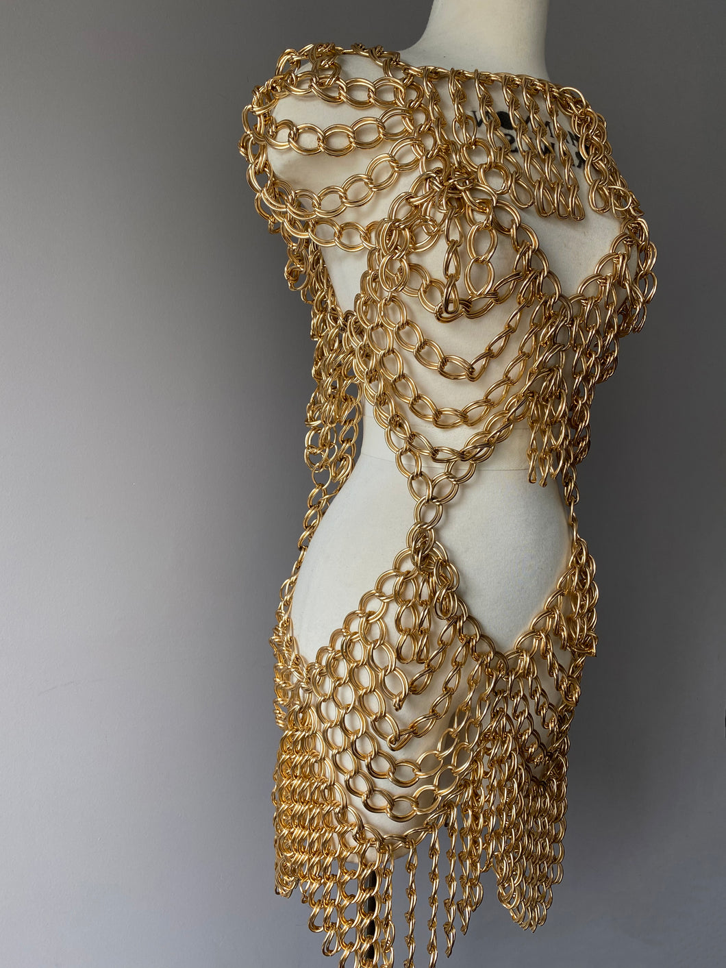 gold chain dress Verona Embellished Diamond In A black mini dress with fierce gold chains Black 2025 New Style Gold